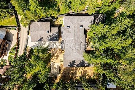 Продажа коттеджей в КП 10888 Рожновка. Современный коттедж на лесном участке